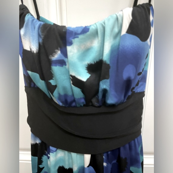 Black floral dress with rouched bodice and a black belt underneath.  Size 12. - Picture 2 of 7